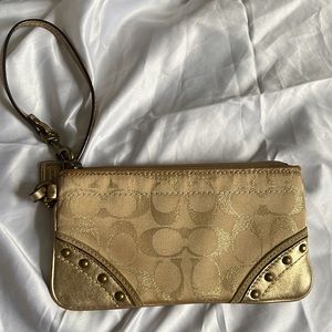 Coach wristlet logo gold